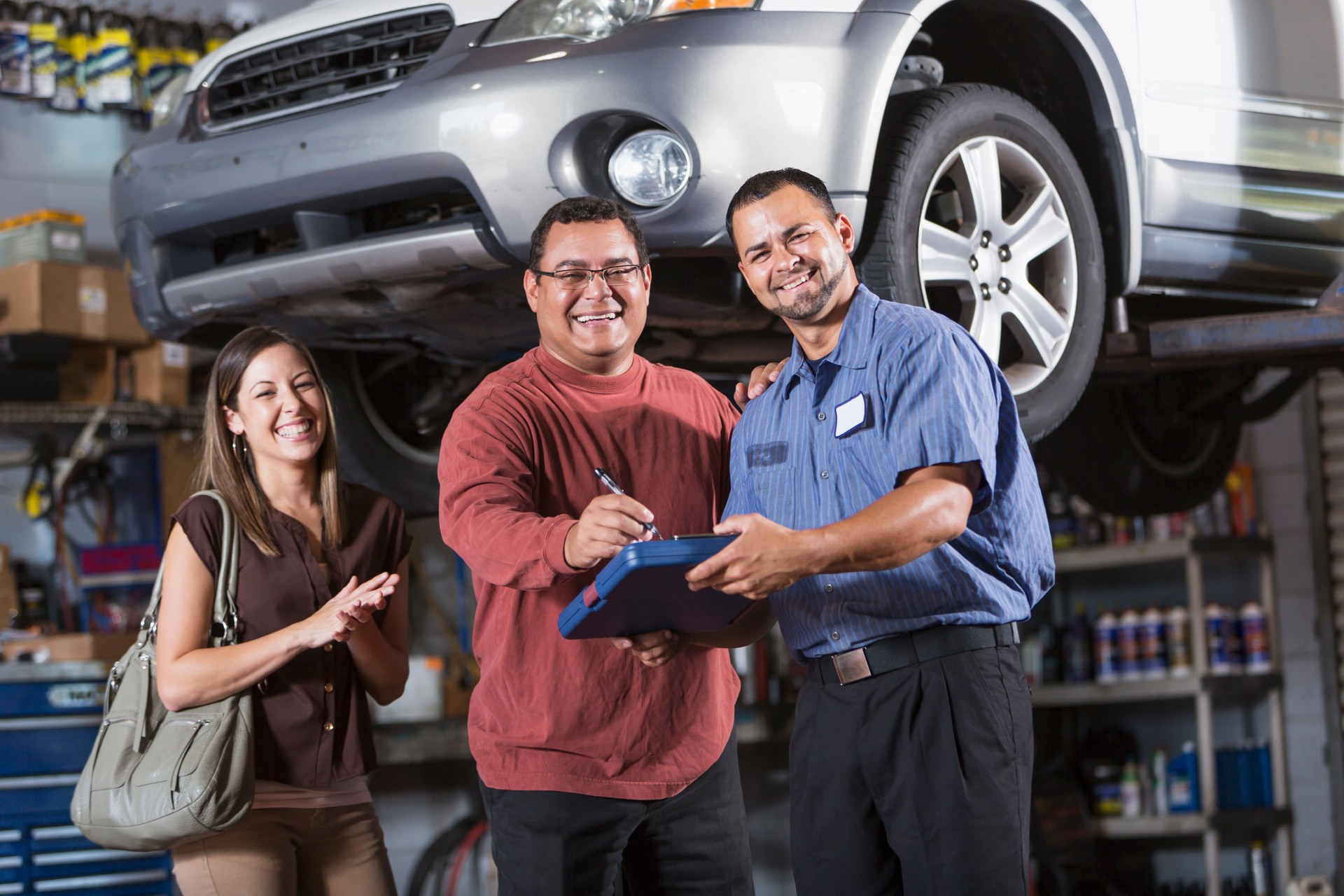 Couple at auto repair shop